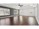 Large bedroom with wood floors, large windows, and trey ceiling with fan at 4434 Oglethorpe Nw Loop, Acworth, GA 30101