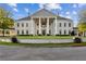 Grand clubhouse featuring a stately facade with towering columns and manicured lawns at 4434 Oglethorpe Nw Loop, Acworth, GA 30101