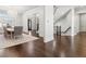 Dining room featuring chandelier, table, and staircase at 4434 Oglethorpe Nw Loop, Acworth, GA 30101
