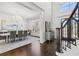 Elegant dining room featuring a crystal chandelier, hardwood floors, and stairs at 4434 Oglethorpe Nw Loop, Acworth, GA 30101