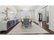 Elegant dining room featuring a crystal chandelier, hardwood floors, and a sideboard at 4434 Oglethorpe Nw Loop, Acworth, GA 30101