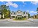 Elegant entryway with a circular driveway and decorative landscaping welcomes visitors at 4434 Oglethorpe Nw Loop, Acworth, GA 30101