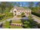 Stunning two-story brick home with meticulously landscaped front yard and circular driveway at 4434 Oglethorpe Nw Loop, Acworth, GA 30101