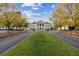 Well-manicured green lawn in front of a classic two-story white building with stately columns at 4434 Oglethorpe Nw Loop, Acworth, GA 30101