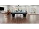 Spacious game room with a pool table, bar area, and access to an outdoor pool area via French doors at 4434 Oglethorpe Nw Loop, Acworth, GA 30101