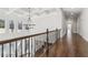 Bright hallway with hardwood floors, coffered ceilings, and large windows letting in ample natural light at 4434 Oglethorpe Nw Loop, Acworth, GA 30101