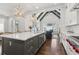 Bright kitchen featuring a large island with white countertop and modern light fixtures at 4434 Oglethorpe Nw Loop, Acworth, GA 30101