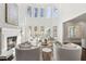 Cozy living room features a fireplace, high ceilings, and lots of natural light at 4434 Oglethorpe Nw Loop, Acworth, GA 30101