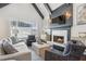 Inviting living room with fireplace, vaulted ceilings, and a view to the backyard at 4434 Oglethorpe Nw Loop, Acworth, GA 30101