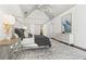Spacious main bedroom with vaulted ceilings, a four-poster bed, and beautiful peacock artwork at 4434 Oglethorpe Nw Loop, Acworth, GA 30101