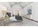 Light and airy main bedroom featuring a canopy bed, decorative wall art, and a decorative lighting fixture at 4434 Oglethorpe Nw Loop, Acworth, GA 30101