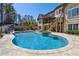 Beautiful pool and spa with stone patio and manicured landscaping at 4434 Oglethorpe Nw Loop, Acworth, GA 30101