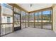 Inviting screened porch with views of backyard and wooded area, perfect for relaxation at 4434 Oglethorpe Nw Loop, Acworth, GA 30101