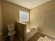 Bathroom with tile floor and a shower and bathtub combo at 904 Crossing Rock Dr, Lawrenceville, GA 30043