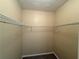 Walk-in closet with shelves at 904 Crossing Rock Dr, Lawrenceville, GA 30043