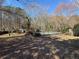 View of the in-ground swimming pool in the backyard of the property at 904 Crossing Rock Dr, Lawrenceville, GA 30043