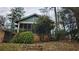 Exterior view of home with steps leading up to the screened porch at 1687 Neely Ave, Atlanta, GA 30344