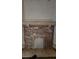 Old brick fireplace with mantel, requiring restoration and repair at 1687 Neely Ave, Atlanta, GA 30344