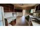 View of a kitchen featuring dated appliances and cabinets at 1687 Neely Ave, Atlanta, GA 30344