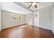 Bright bonus room featuring brick wall, neutral paint, modern flooring and direct access to outside at 3606 Trickum Ne Rd, Marietta, GA 30066