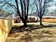 A backyard with a newly constructed wooden fence adds privacy at 2257 Collins Dr, East Point, GA 30344