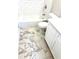 Bathroom with marble floors, updated shower fixtures, and white shaker cabinets at 2257 Collins Dr, East Point, GA 30344