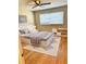 Cozy bedroom with hardwood floors, a large window and minimalist decor at 2257 Collins Dr, East Point, GA 30344