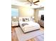Inviting bedroom with neutral tones, wood floors, and plenty of natural light at 2257 Collins Dr, East Point, GA 30344