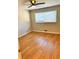 Bedroom showcasing the hardwood floors with a window view at 2257 Collins Dr, East Point, GA 30344