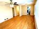 Spacious living room with hardwood floors, neutral paint, and plenty of room for furniture at 2257 Collins Dr, East Point, GA 30344