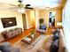 Bright living room with hardwood floors, modern decor, and ample natural light at 2257 Collins Dr, East Point, GA 30344