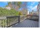 Back deck area featuring wood floors and railings overlooking the yard at 3242 Kingswood Gln, Decatur, GA 30034