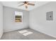 Bright bedroom with a ceiling fan and a window view of the outdoors at 3242 Kingswood Gln, Decatur, GA 30034