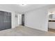 Bedroom with painted closet doors leading into a bathroom with a granite sink at 3242 Kingswood Gln, Decatur, GA 30034