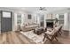 Bright living room boasts modern furniture, a ceiling fan, and a cozy fireplace at 3242 Kingswood Gln, Decatur, GA 30034