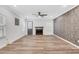 Bright living room with hardwood floors, fireplace, and neutral colored walls at 3242 Kingswood Gln, Decatur, GA 30034