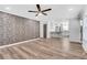 Open concept with a living room and an eat-in kitchen with stainless steel appliances at 3242 Kingswood Gln, Decatur, GA 30034