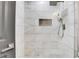 New shower features gorgeous white marble tile and a built-in shower niche at 3242 Kingswood Gln, Decatur, GA 30034