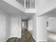 Open foyer showcasing hardwood floors, white walls, and an inviting atmosphere at 4200 Flakes Mill Manor Ln, Ellenwood, GA 30294