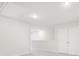 Attic space featuring recessed lighting, light gray carpet, and a closet at 2021 Wyndham Pl, Conyers, GA 30013