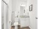 Modern bathroom featuring neutral tones, a vanity with granite counters, and a shower stall at 2021 Wyndham Pl, Conyers, GA 30013