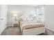 Charming bedroom with natural light, neutral walls, and a comfortable bed at 2021 Wyndham Pl, Conyers, GA 30013