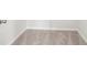 Neutral colored carpet with white trim on walls at 2021 Wyndham Pl, Conyers, GA 30013