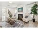 Bright living room featuring a fireplace, comfortable seating, and an open concept design at 2021 Wyndham Pl, Conyers, GA 30013