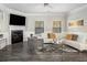 Cozy living room featuring a fireplace, neutral décor, and ample seating, perfect for relaxation at 158 Bryon Ln Ln, Acworth, GA 30102