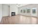 Cozy living area showcasing a fireplace and seamless indoor-outdoor flow at 2023 Wyndham Pl, Conyers, GA 30013