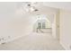 A bright and airy bonus room features carpet and natural light from the window at 5275 Redfield Ct, Atlanta, GA 30338