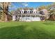 Charming home with a full front porch and well maintained yard at 935 Old Loganville Rd, Loganville, GA 30052