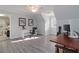 Open office area with wood floors, natural light, and ample space for work and productivity at 935 Old Loganville Rd, Loganville, GA 30052