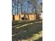 A fenced-in backyard providing a private outdoor space for relaxation and entertainment at 1677 Grey Fox Ct, Lawrenceville, GA 30044
